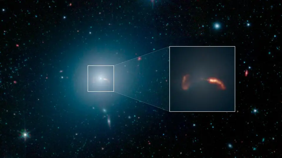 A galáxia M87 vista pelo telescópio Spitzer, com o detalhe do buraco negro central